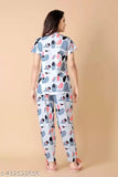 Multicolor polycotton women's nightdress with short sleeves and pyjama bottoms, printed pattern on display