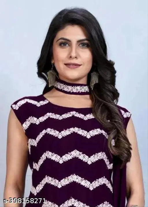 Georgette multi-sequin stitched salwar suit with dupatta. Sleeveless, embroidered Indian eveningwear