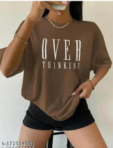 Stylish printed oversized women's cotton blend t-shirt in various sizes, featuring vibrant design