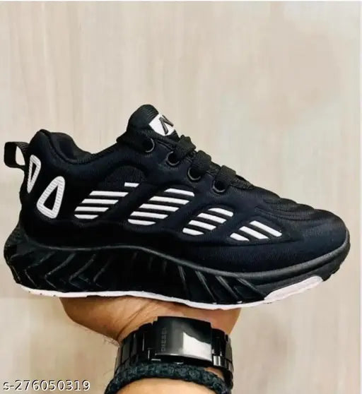 High-quality mesh boys' sports shoes in striped pattern, PU sole, lace-up fastening. Ideal for active play and casual wear. Perfect for ages 4.5-12 years. Made in India