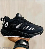 High-quality mesh boys' sports shoes in striped pattern, PU sole, lace-up fastening. Ideal for active play and casual wear. Perfect for ages 4.5-12 years. Made in India