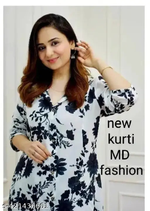 Black printed rayon kurta set with rayon pants, three-quarter sleeves, Indian origin