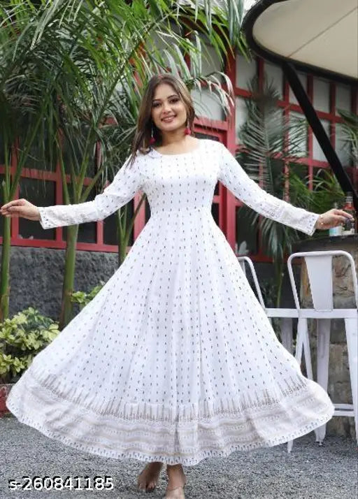 White rayon long-sleeved block-printed kurta gown with checked pattern, tassels, and latkan detail - Indian handcrafted traditional attire on mannequin
