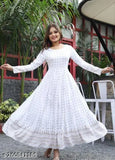 White rayon long-sleeved block-printed kurta gown with checked pattern, tassels, and latkan detail - Indian handcrafted traditional attire on mannequin