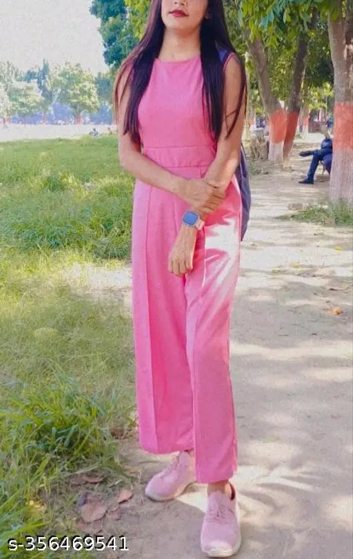 Peach viscose jumpsuit, sleeveless, flowing design, exudes elegance, India origin