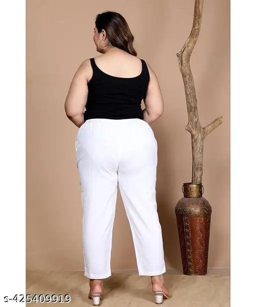 Trendy cotton lycra jumbo trousers with 2 side pockets for plus size women - loose ankle-length pants with bottom slit, India origin