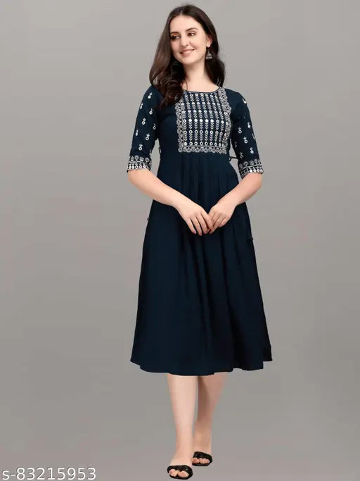 Embroidered rayon work kurta in classic colors, three-quarter sleeve with relaxed fit. Suitable for work, casual, party, or festive wear. Machine washable Indian garment