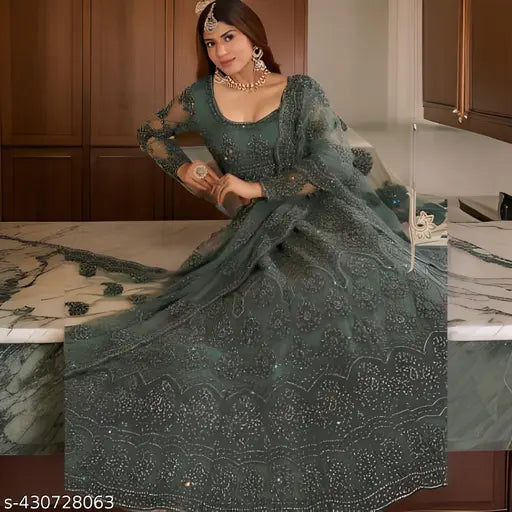NEW Fashion heavy semi-stitched Lehenga Choli in net fabric with embroidered patterns. Indian bridal wear on display