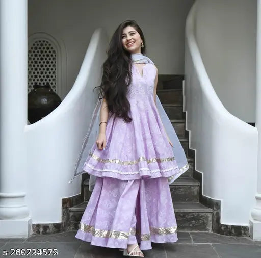 Lavender rayon A-line dupatta set with sharara bottom, three-quarter sleeves. Indian fashion for women's weddings, festivals, parties. Eye-catching printed net design