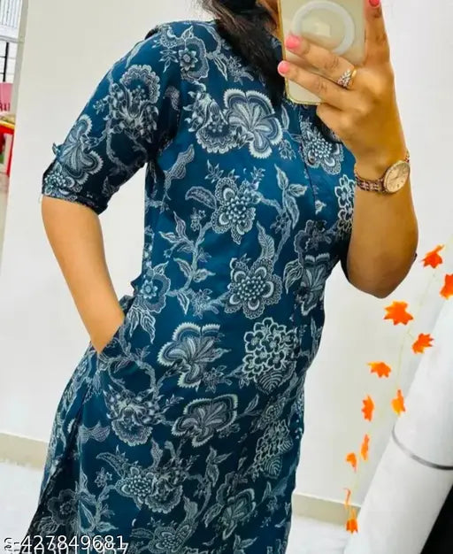 Rayon printed kurta sets with palazzo bottoms by Preeti Fashion, featuring short sleeves and vibrant patterns, available in multiple sizes: M, L, XL, XXL