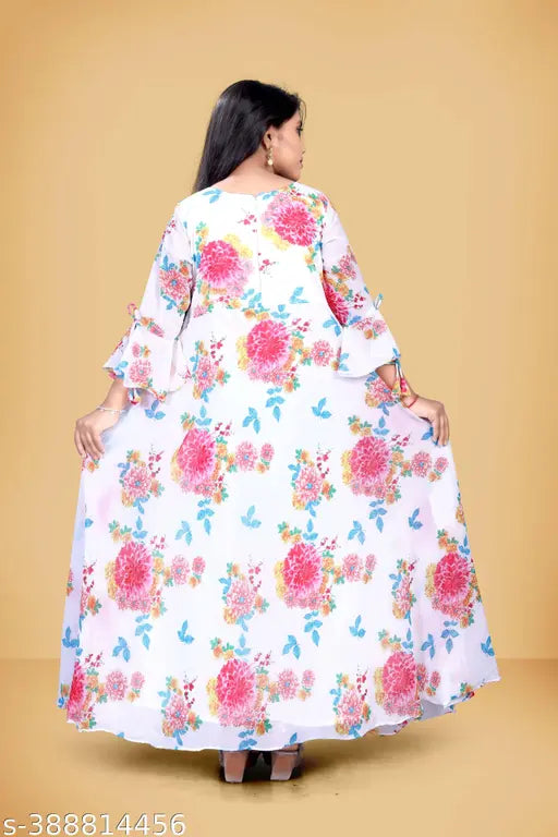 Classy cotton blend combo dresses for kids (9-16 years), printed net pattern, three-quarter sleeves - Indian children's formal wear on display rack
