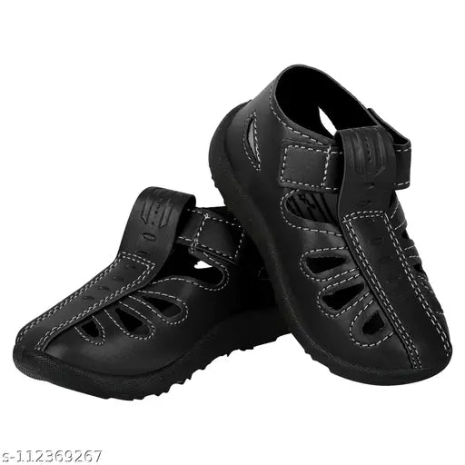 Black PVC kid's summer sandals from Kick Up, featuring Velcro fastening and a soft sole for comfortable wear. Ideal for boys aged 9-12 months to 3.5-4 years