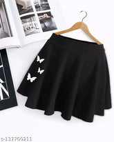 Black polyester flared mini skirt for women - Western stylish design, elastic waistband, slip-on closure, and solid black color. Perfect for versatile outfits, hand wash recommended. Sizes: 26, 28, 30 (Waist 26/28/30 in, Length 15 in, Hip 34/36/38 in). Indian original brand