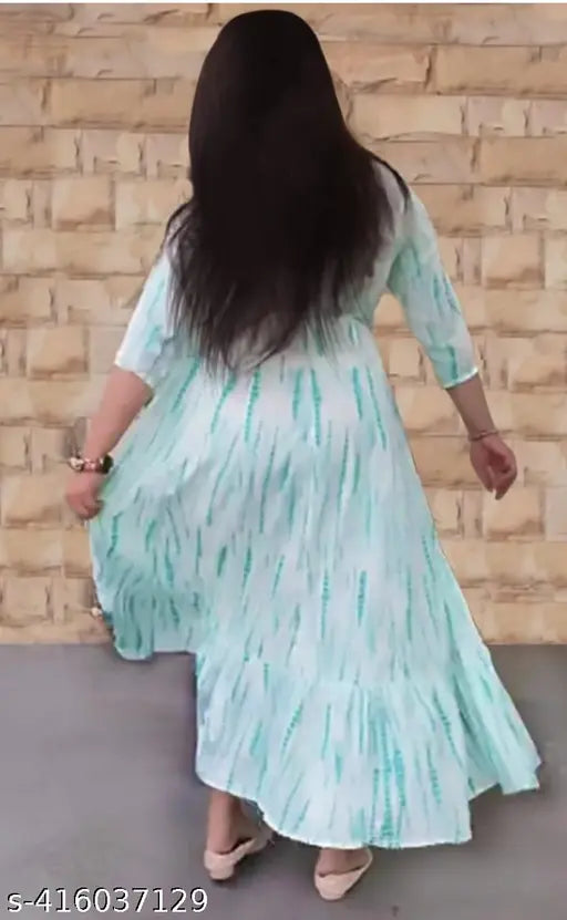 Green embroidered festival gown by Maheen Exports, Rayon material with three-quarter sleeves, dyed/washed tie-dye print for festive occasions