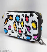 Multicolor synthetic unisex mini suitcase sling bag with detachable belt, ideal for travel. Navy blue colorblock design, free size (7in x 3in x 4in)