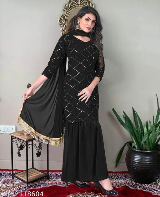 Green Georgette Sharara Dupatta Set with Embellished Kurta and Bottomwear, Indian women's fashion on display" (124 characters)