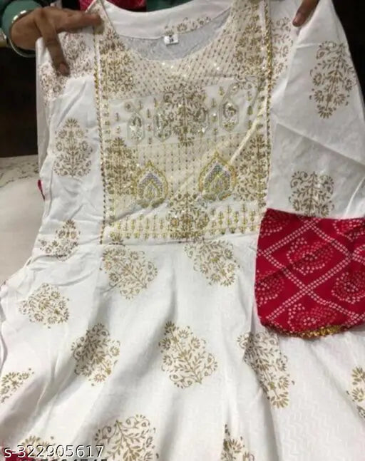 White rayon anarkali kurti with intricate embroidery, perfect for special occasions