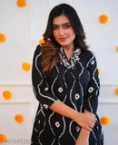 Tejas black handwork rayon kurta set with palazzos, printed net pattern on display