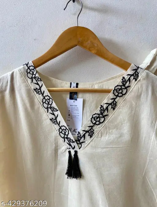 White rayon V-neck 3/4 sleeve dress and pant set with heavy black embroidery, Indian origin