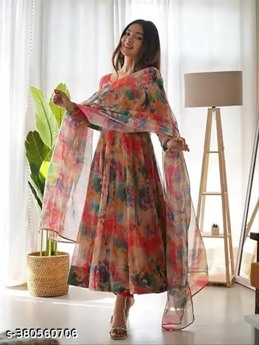 Georgette and soft silk pink kurta with dupatta, printed set with three-quarter sleeves. Indian women's fashion on model