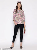 Printed cotton blend women's top with three-quarter sleeves, vibrant pattern on soft fabric, available in sizes S, M, L, XL