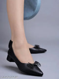 Synthetic slip-on black sandals for women & girls, featuring pointed toe and bow detail, classic style