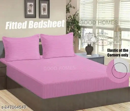 Pink Glace Cotton striped elastic double bedsheet with two pillow covers, ideal for summer adult use, displayed on a bed