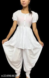 Girls crepe A-line clothing sets with dhoti pants, self-design, short sleeves. Various sizes from 3-16 years. Indian origin