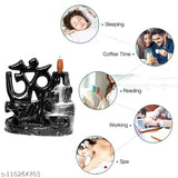 Handcrafted black resin OM design fountain incense holder with backflow cone and 10 scented incense cones, featuring a smokey waterfall effect. Indian artifact showpiece for home decor