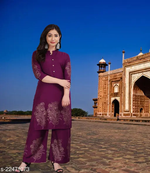 Colorblocked rayon kurta and palazzo set, gold print stitching on women's fashionable Indian clothing