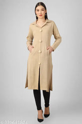Cream wool high-slit shirt kurti from BLUSHH COLLECTION, ideal for winter wear with long sleeves and a solid pattern. Buttons ornamentation adds unique style. Perfect with leggings, pants, palazzo, or salwar. Indian origin