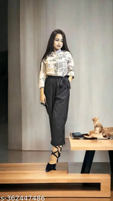 Peach-colored printed poly crepe women's jumpsuit with three-quarter sleeves, great for versatile style