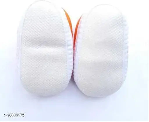 Stylish orange PU baby booties with velcro fastening and embellished net, suitable for 0-12 months old