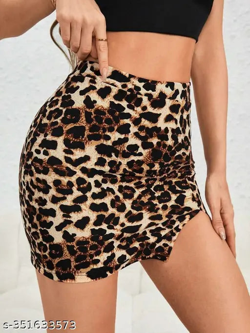 Black knitted mini printed bodycon skirt with split neckline and semi-sheer fabric, 93% polyester and 7% elastane. Sizes: 26 (waist 26in, hip 30in), 28 (waist 28in, hip 32in), 30 (waist 30in, hip 34in), 32 (waist 32in, hip 36in). Made in India