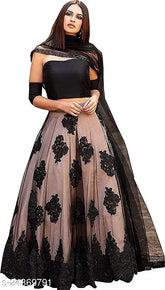 Black sen Women satin top with net bottom and embellished dupatta, semi-stitched free size (Lehenga waist 39m, length 44m, dupatta length 2.25m). Indian traditional ethnic wear set on display