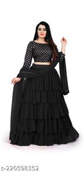 Stylish black flared satin lehenga with net dupatta, embroidered and embellished, Indian women's traditional wear on display