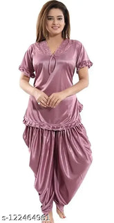 Satin knee-length night suit combo for women, printed in vibrant patterns, perfect for a cozy night