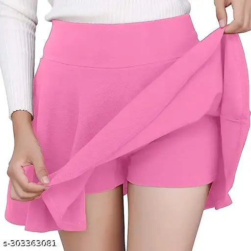 A-line flared, high waist poly cotton spandex sports/casual wear skirt with laser cutout scallop hem, double layer for comfort and range of motion. Available sizes: 26 (Waist 26in, Length 18in), 28 (Waist 28in, Length 18in), 30 (Waist 30in, Length 18in), 32 (Waist 32in, Length 18in), made in India