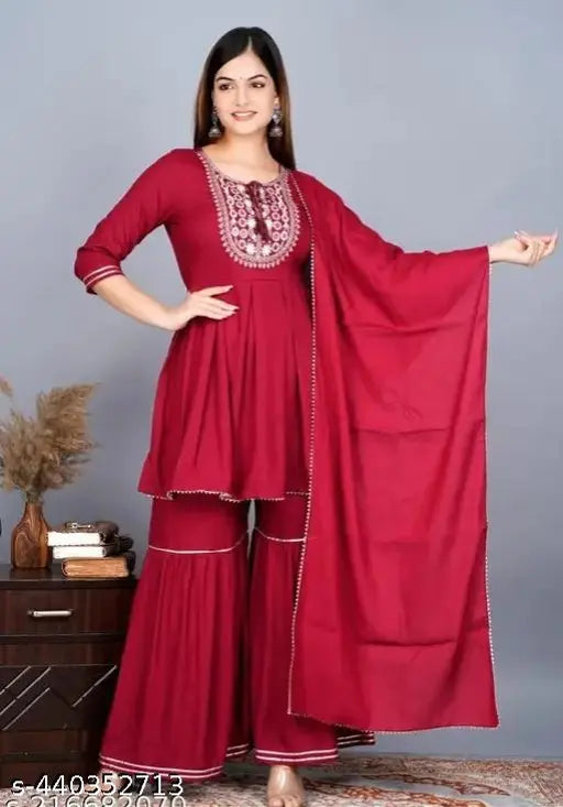 Rayon print kurta sharara set with dupatta, Adrika Voguish women's fashion. Three-quarter sleeve, sequinned embroidery, premium rayon fabric. Ideal for various occasions and sizes M-XXL. Made in India