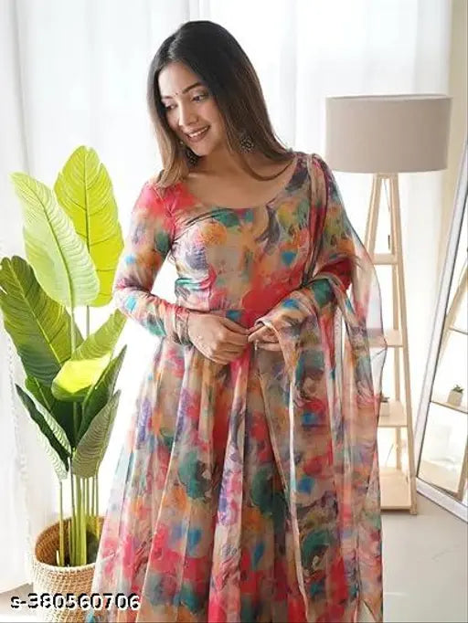 Georgette and soft silk pink kurta with dupatta, printed set with three-quarter sleeves, ankle length. Indian women's fashion accessory on display