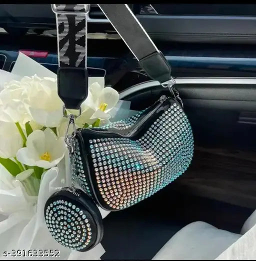 Acrylic Fantastiqo Rhinostone trendy women's sling bag with coin pouch, embellished net design. Crossbody fashion accessory from India." (124 characters)