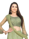 Green embroidered nylon net Vaksha Pista flared lehenga with unstitched blouse on mannequin