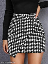 Black polyester mini skirt with textured pattern and buttons, suitable for formal occasions and night parties. Fits regular waist sizes 26-32 inches, length size 15-16 inches, and hip size 30-36 inches. Made in India