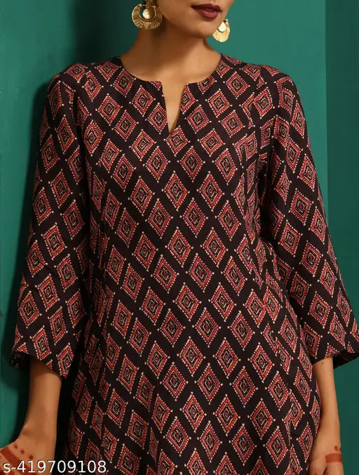 Viscose Rayon printed kurta pant set for women, vibrant Indian fashion with three-quarter sleeves and comfortable fit