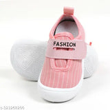 Pink canvas baby shoes with anti-skid sole, memory foam cushioning, and Velcro fastening in a Chu Chu Sound musical design for toddlers aged 3 months to 3 years