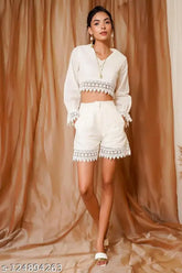 White cotton crop top & short set with lace work, 100% cotton for a soft and comfortable fit. Side matching invisible zip closure. Great for pairing with shoes, heels, or flats. Western style, relaxed fit, V-neck, full-sleeve, knee length. Made in India