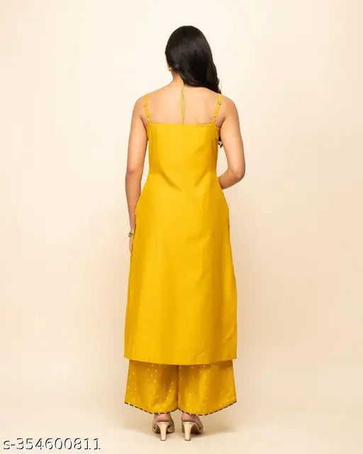 Yellow silk blend straight kurta with palazzo and dupatta, featuring sleeveless, round neck, and calf length design. Perfect for festive and party occasions. Set includes 3 pieces in sizes S-XXL, made in India