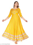 Yellow rayon printed long Anarkali kurti, three-quarter sleeves, perfect for festivals. Soft, comfy, breathable, and stylish ethnic wear." (98 characters)