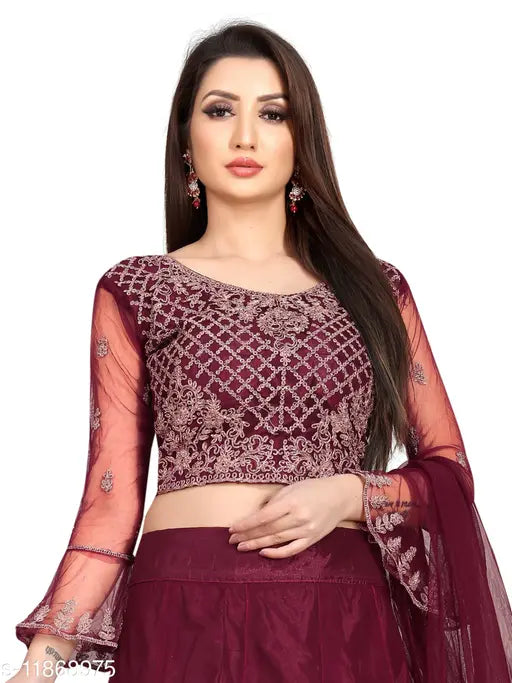 Arvika maroon embroidered nylon net flared lehenga, unstitched blouse - Indian wedding wear on mannequin" (123 characters)