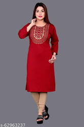 Woolen, embroidered winter kurti in three-quarter sleeves. Multicolor, trendy, comfortable design for regular use. Indian craftsmanship and beautiful multicolor embroidery